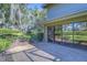 Private patio with access to a spacious backyard at 5333 Cobblestone Ct, Wesley Chapel, FL 33543