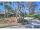 Paved driveway with landscape and house in background at 5333 Cobblestone Ct, Wesley Chapel, FL 33543