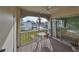 Private balcony with seating area and view of the community at 7701 Starkey Rd # 322, Seminole, FL 33777