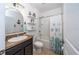 Bathroom featuring a tub, vanity and shelving for ample storage at 1523 Glen Grove Loop, Wesley Chapel, FL 33543