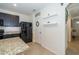 Well-designed kitchen with granite countertops, a pantry, and black appliances at 1523 Glen Grove Loop, Wesley Chapel, FL 33543