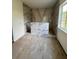 Unfinished bathroom featuring tiled walls and dual shower space at 3403 W Leona St, Tampa, FL 33629