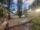 Spacious backyard with a shed and wooden fence at 410 73Rd Ave, St Pete Beach, FL 33706