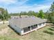 Features a spacious covered patio that offers an ideal setting for relaxation and entertaining outdoors at 4880 Hickory Oak Dr, Brooksville, FL 34601