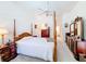 Main bedroom with wood furniture and ceiling fan at 3002 Minuteman Ln, Brandon, FL 33511