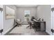 Home office with desk, chair, and large window at 4880 Hickory Oak Dr, Brooksville, FL 34601