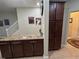 Well-equipped kitchen boasting granite countertops and substantial storage at 9629 Trumpet Vine Loop, Trinity, FL 34655