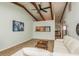 Living room with white sectional and kitchen passthrough at 1500 Mahogany Ln # 605, Palm Harbor, FL 34683