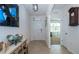Bright and spacious entryway with tile floors and view to other rooms at 1523 Glen Grove Loop, Wesley Chapel, FL 33543