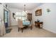 Charming dining area with four chairs and a round table at 1523 Glen Grove Loop, Wesley Chapel, FL 33543