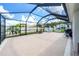 Large screened enclosure, perfect for outdoor enjoyment at 1523 Glen Grove Loop, Wesley Chapel, FL 33543