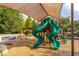 Modern playground with a large spiral slide and shade structure at 1523 Glen Grove Loop, Wesley Chapel, FL 33543