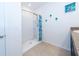 Clean bathroom with a walk-in shower and tiled floor at 1523 Glen Grove Loop, Wesley Chapel, FL 33543