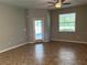 Spacious living room featuring tile floors and a ceiling fan at 2126 Richwood Pike Dr, Ruskin, FL 33570