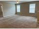 Spacious bonus room with carpet and two windows at 2126 Richwood Pike Dr, Ruskin, FL 33570