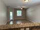 Bright living room with tile floors and sliding glass door at 2126 Richwood Pike Dr, Ruskin, FL 33570