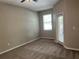 Large bedroom with neutral walls and carpeted floors at 2126 Richwood Pike Dr, Ruskin, FL 33570