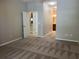 Primary bedroom with access to the bathroom and a large closet at 2126 Richwood Pike Dr, Ruskin, FL 33570
