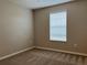 Bedroom with carpeted flooring and window blinds at 2126 Richwood Pike Dr, Ruskin, FL 33570