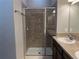 Bathroom with shower stall and double vanity at 2126 Richwood Pike Dr, Ruskin, FL 33570