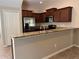 Kitchen with stainless steel appliances and granite countertops at 2126 Richwood Pike Dr, Ruskin, FL 33570