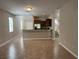 Open concept kitchen boasting granite countertops and dark wood cabinets at 2126 Richwood Pike Dr, Ruskin, FL 33570