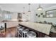 Beautiful kitchen with large island, pendant lighting, and white cabinetry at 1229 S Roxmere Rd, Tampa, FL 33629