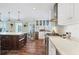 Well-equipped kitchen featuring a wine cooler, marble countertops and stainless steel appliances at 1229 S Roxmere Rd, Tampa, FL 33629