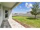 An inviting, fenced backyard with a well-maintained lawn and a paved patio at 13719 Brookside Haven St, Riverview, FL 33578