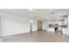 Bright and airy open-concept living area with modern fixtures and finishes at 13719 Brookside Haven St, Riverview, FL 33578