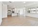 Spacious open floor plan connecting the kitchen and living area, filled with natural light at 13730 Evergreen Valley Dr, Riverview, FL 33578