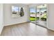 A light-filled living space with sliding glass doors leading to an outdoor patio at 13730 Evergreen Valley Dr, Riverview, FL 33578