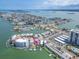 Waterfront property with docks, boat lifts, pool, and Gulf views at 241 Skiff Pt # 4, Clearwater Beach, FL 33767