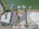 Waterfront property with docks, boat lifts, and lush landscaping, a waterfront paradise at 241 Skiff Pt # 4, Clearwater Beach, FL 33767
