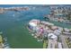 Waterfront property with docks, boat lifts, Gulf views, and close proximity to the beach at 241 Skiff Pt # 4, Clearwater Beach, FL 33767
