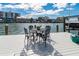 Waterfront home featuring a dock with seating, with bay views at 241 Skiff Pt # 4, Clearwater Beach, FL 33767