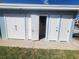Outdoor storage with multiple doors, providing ample space for storing outdoor equipment at 241 Skiff Pt # 4, Clearwater Beach, FL 33767