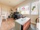Home office with desk, monitors, and stained-glass window at 216 Gloucester Blvd # 216, Sun City Center, FL 33573