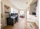 Home office features wood floors, built-in shelving and stained glass window at 216 Gloucester Blvd # 216, Sun City Center, FL 33573