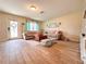 Living room with tile floors, sofas, and a coffee table at 216 Gloucester Blvd # 216, Sun City Center, FL 33573