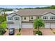 Townhouse-style home with attached garage at 10012 Corso Milano Dr, Tampa, FL 33625