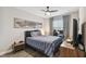 Bright bedroom with a comfortable bed, and a workspace at 10012 Corso Milano Dr, Tampa, FL 33625