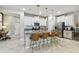 Modern kitchen with stainless steel appliances and granite countertops at 10012 Corso Milano Dr, Tampa, FL 33625