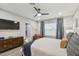 Bright bedroom with ensuite bathroom, large bed, and plenty of natural light at 10012 Corso Milano Dr, Tampa, FL 33625