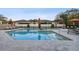 Inviting community pool with plenty of seating at 10012 Corso Milano Dr, Tampa, FL 33625
