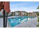 Relaxing community pool area with lounge chairs at 10012 Corso Milano Dr, Tampa, FL 33625