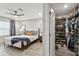 Main bedroom with walk-in closet and ensuite bathroom at 10012 Corso Milano Dr, Tampa, FL 33625