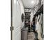 Large walk-in closet with ample shelving and storage at 10012 Corso Milano Dr, Tampa, FL 33625