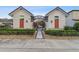 Attractive community pool entrance with landscaping at 10012 Corso Milano Dr, Tampa, FL 33625