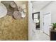 Entryway with accent wall, a staircase, and a view to another room at 10012 Corso Milano Dr, Tampa, FL 33625